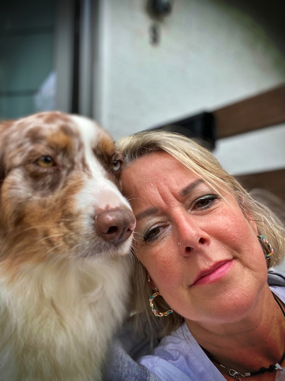 Foto von Regina mit ihrem Hund
